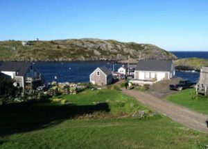 Monhegan Harbor, with Manana Island in the background Photo by Bob Schutsky