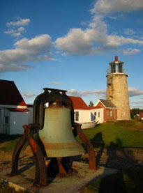 Historic lighthouse and bell Photo by Kim Schutsky